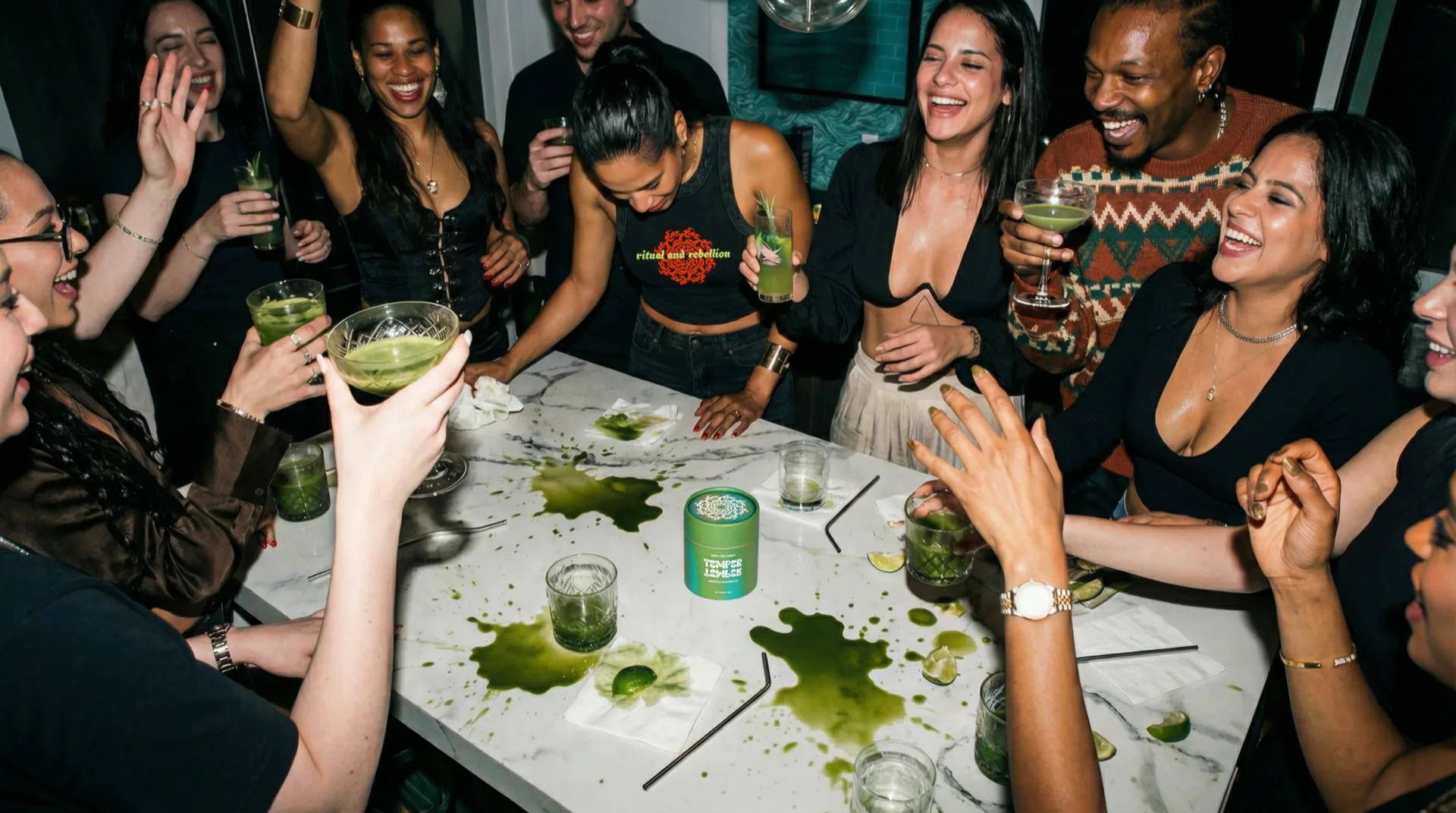 Friends making matcha drinks at a house party